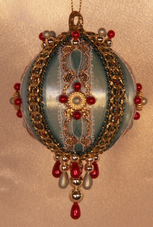 Bright Red and teal, the colors of India and a Vintage trim on these Christmas Ornaments