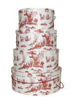 Victorian Toile Design in Red on this set of hatboxes