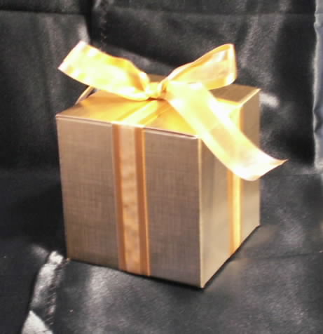 Beautiful Gold Gift Box Tied with a Ribbon 